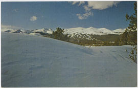 Snowy landscape and view of Breckenridge ski area and Tenmile Range