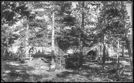 Mary Marks in a hammock at the survey and engineering crew's campsite