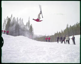 Trygve Berge executes a somersault on skis at Breckenridge ski area