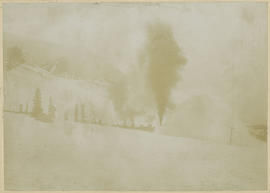 Train engines push the rotary snow plow on its way to Boreas Pass east of Breckenridge