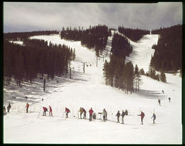 Skiers in line for Chairlift 2, midway on Peak 8 of Breckenridge ski area