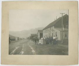 People stand side by side outside the Summit House in Montezuma