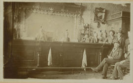 Owner John Dewers behind his bar at the Corner Saloon on Main Street