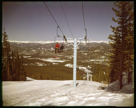 Skiers ride Chairlift 1 on Peak 8 of the Breckenridge ski area