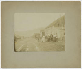 People stand side by side outside the Summit House in Montezuma