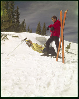 Two skiers pose at Peak 8 of the Breckenridge ski area