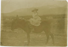 Young Ella (Foote) Theobald rides a burro