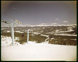 Skiers ride Chairlift 1 on Peak 8 of the Breckenridge ski area