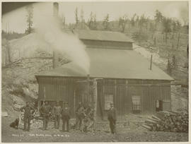 Men outside the Blue Hill Mining Company mill at the Minnie Mine east of Breckenridge