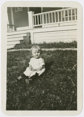 Young June Kaiser on the front lawn of her family's house in Breckenridge