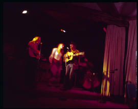 Musicians on stage in a lounge in Breckenridge