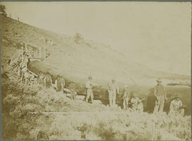 Men constructing the hydropower pipeline on Gold Hill north of Breckenridge, Colorado